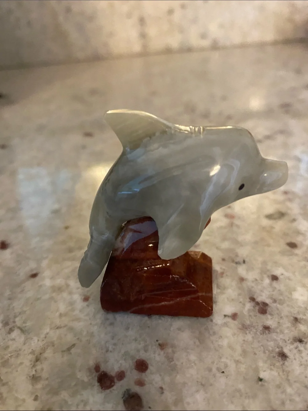 Stone dolphin figure. NWT about 1.5x2.5 in. Summer